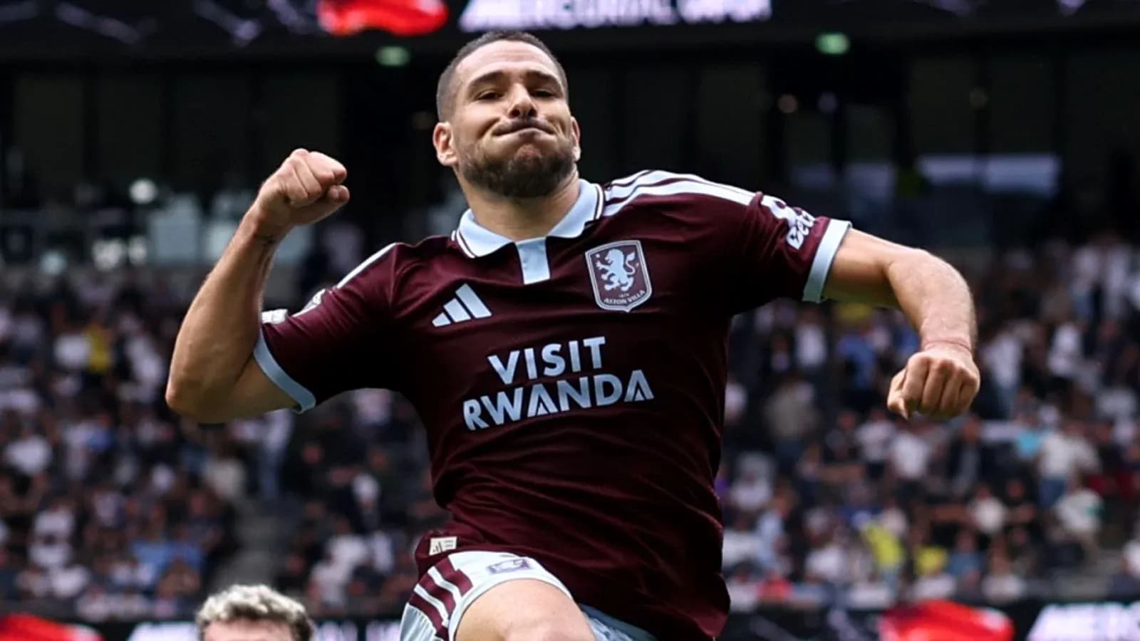 Player celebrating a goal in Aston Villa kit Player celebrating a goal in Aston Villa kit