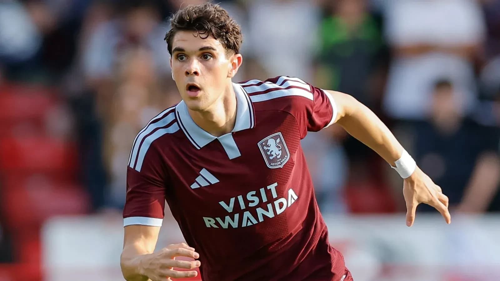 Player running during Aston Villa match Player running during Aston Villa match