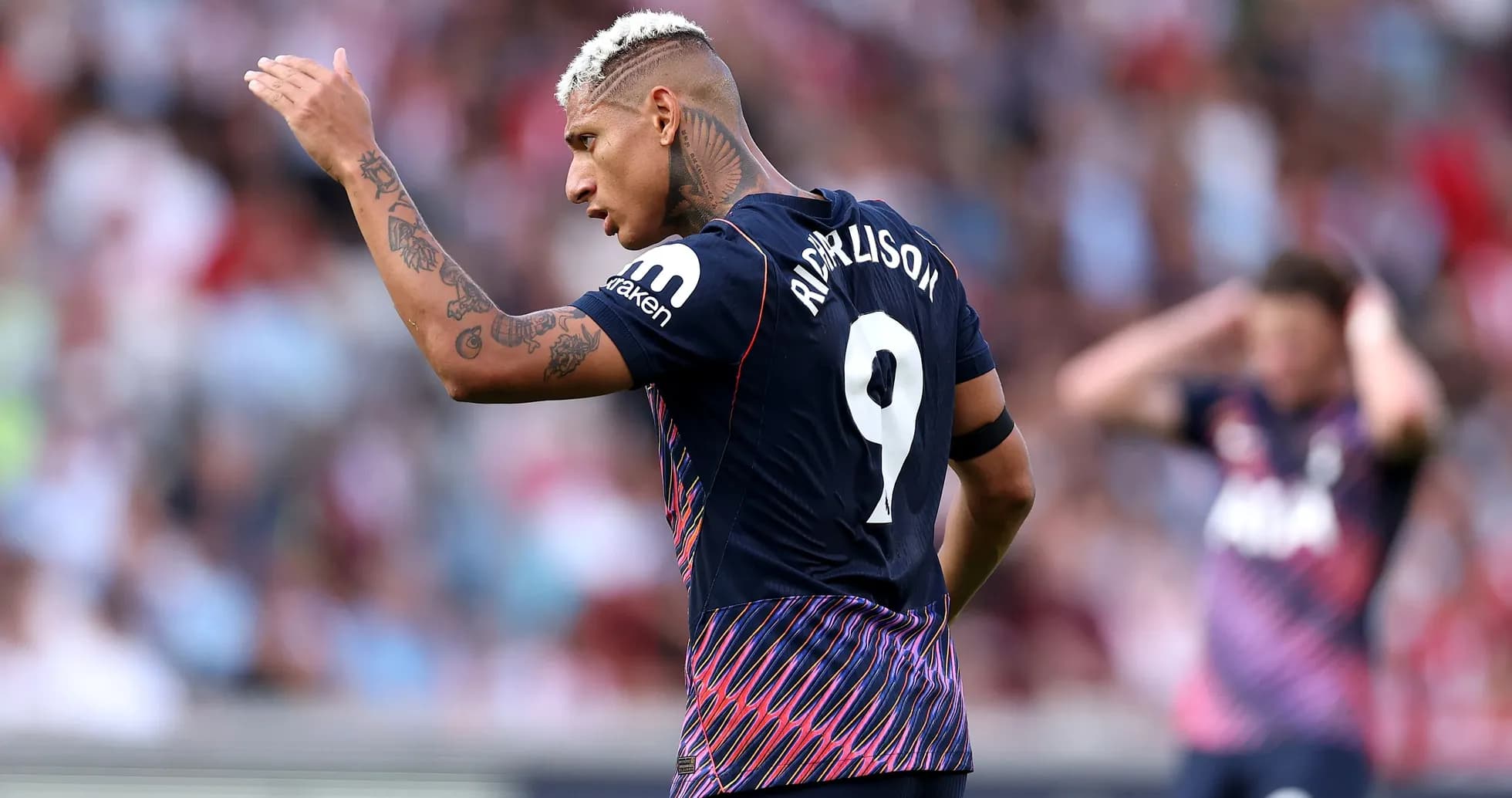 Richarlison gesturing during a match Richarlison gesturing during a match