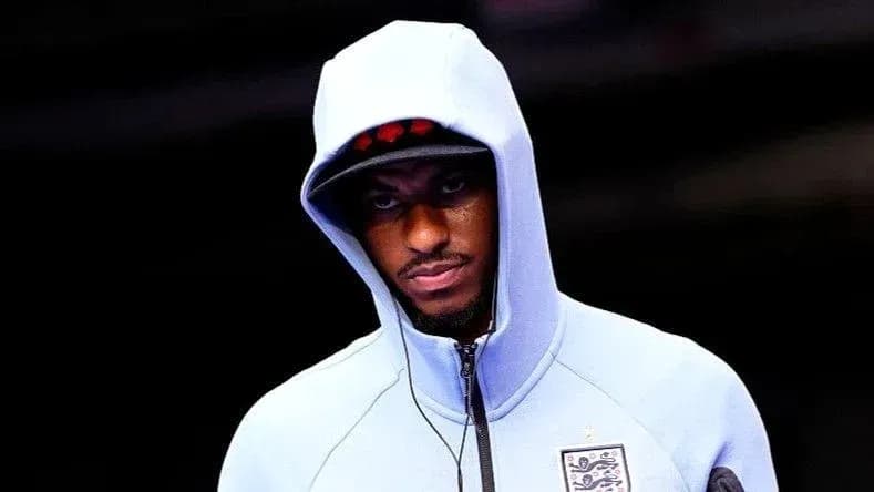 Player wearing a hooded sweatshirt before match Player wearing a hooded sweatshirt before match