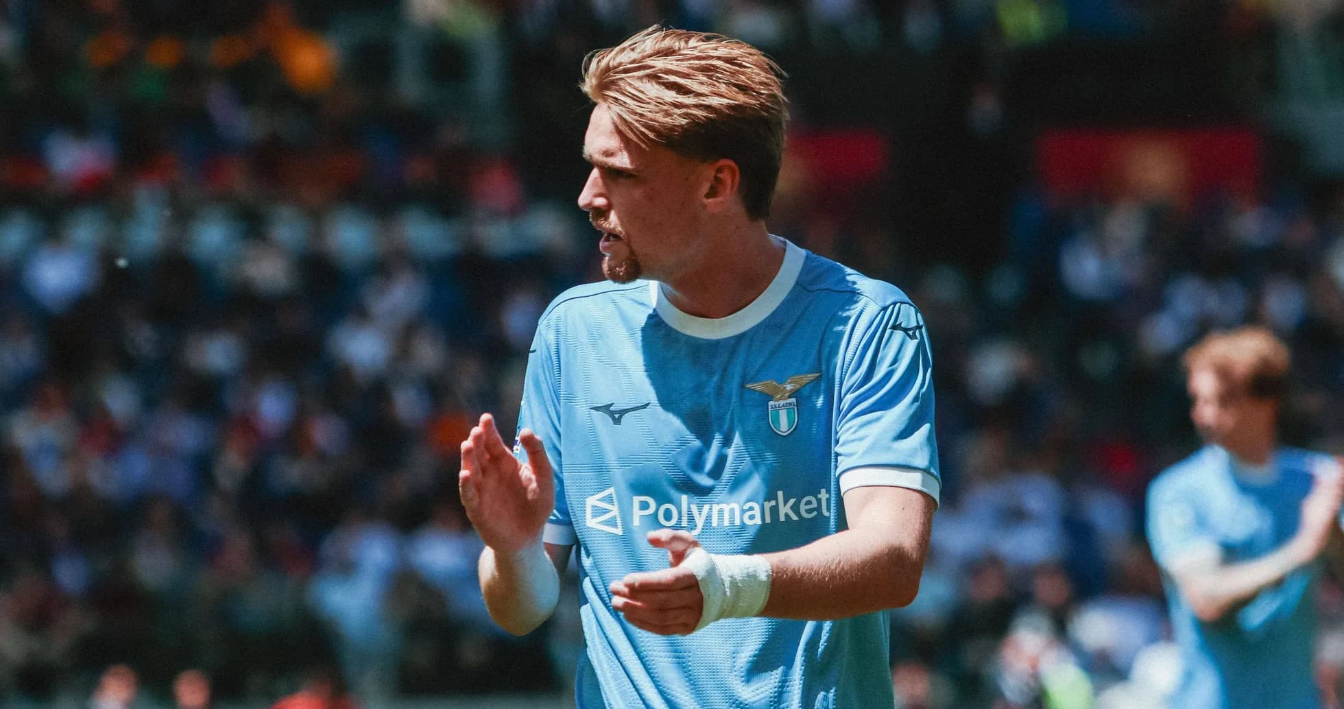 Lazio player clapping during match at stadium Lazio player clapping during match at stadium