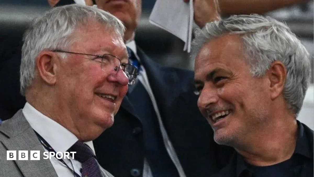 Two men smiling and conversing in a crowd Two men smiling and conversing in a crowd