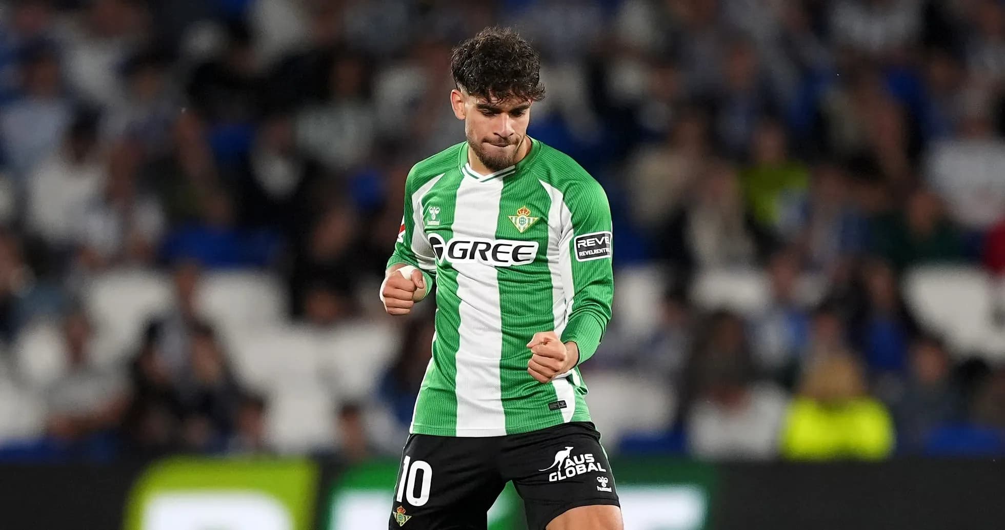 Player celebrating in Real Betis green jersey Player celebrating in Real Betis green jersey