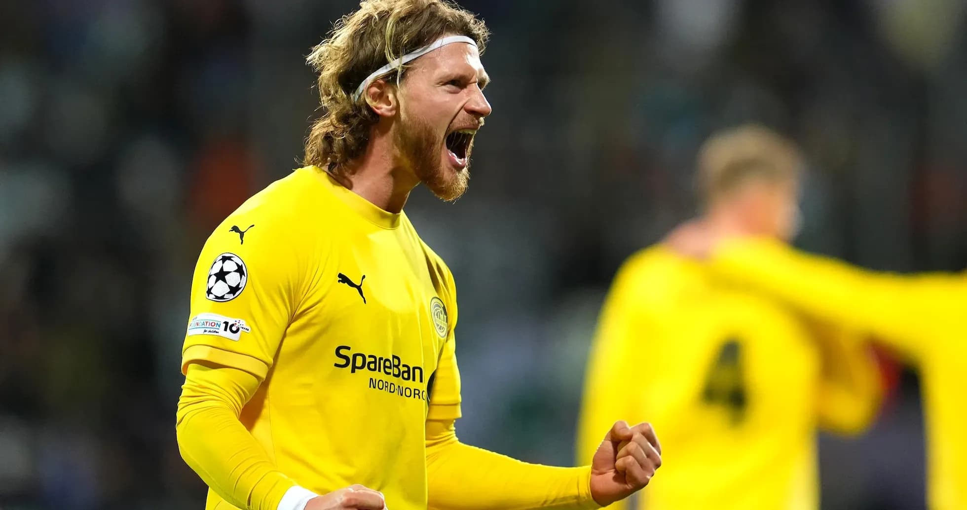 Goalkeeper celebrating during UEFA Champions League match Goalkeeper celebrating during UEFA Champions League match