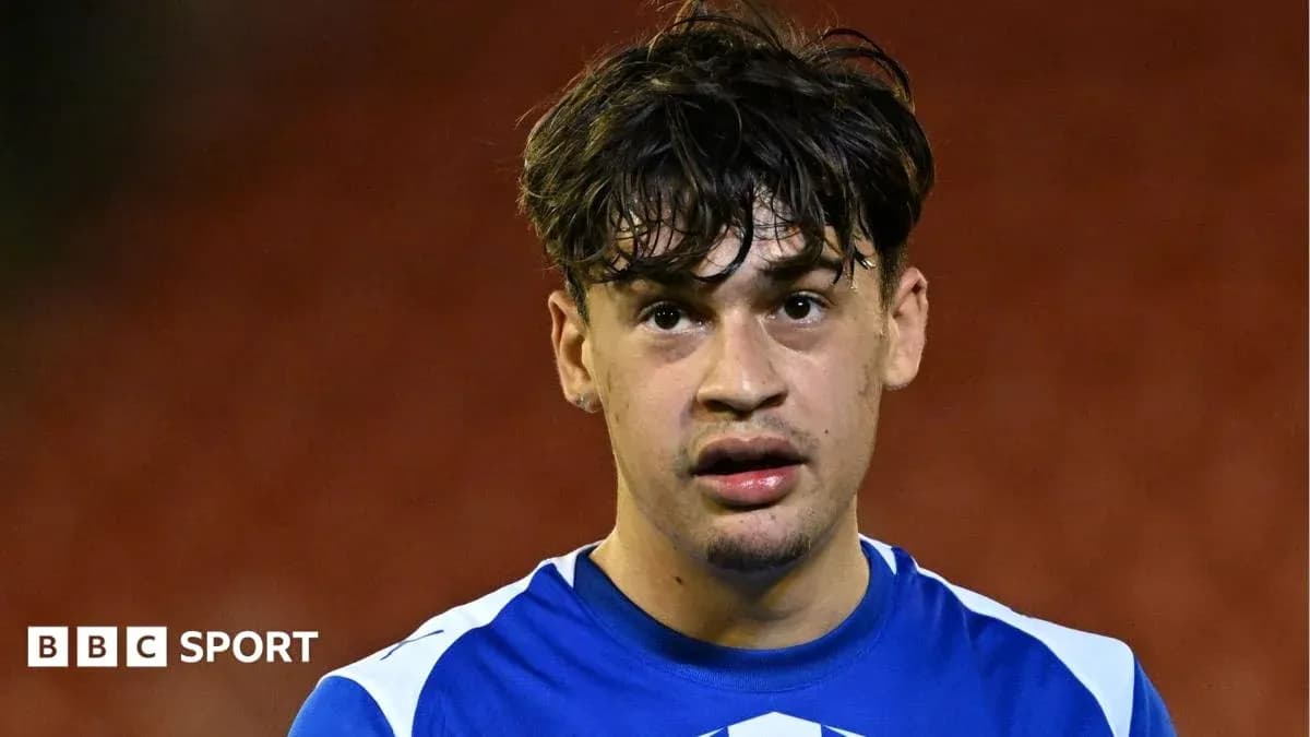 Player wearing blue jersey during post-match interview Player wearing blue jersey during post-match interview