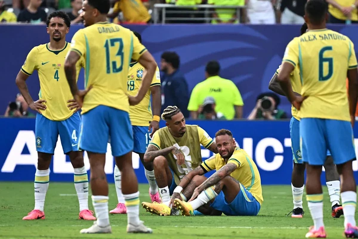 Brazilian players gathered around injured teammate Neymar Brazilian players gathered around injured teammate Neymar