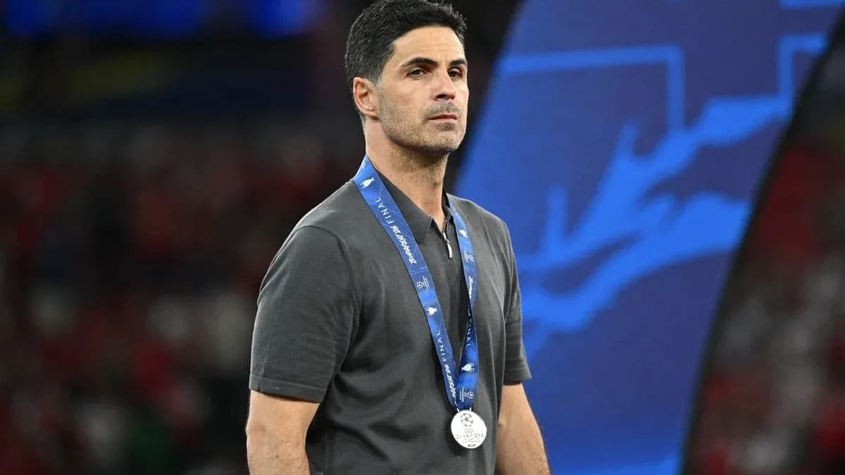 Coach wearing a medal after a match Coach wearing a medal after a match