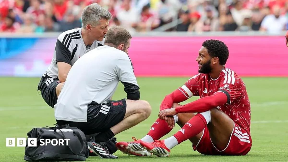 Player receiving medical attention on the field Player receiving medical attention on the field