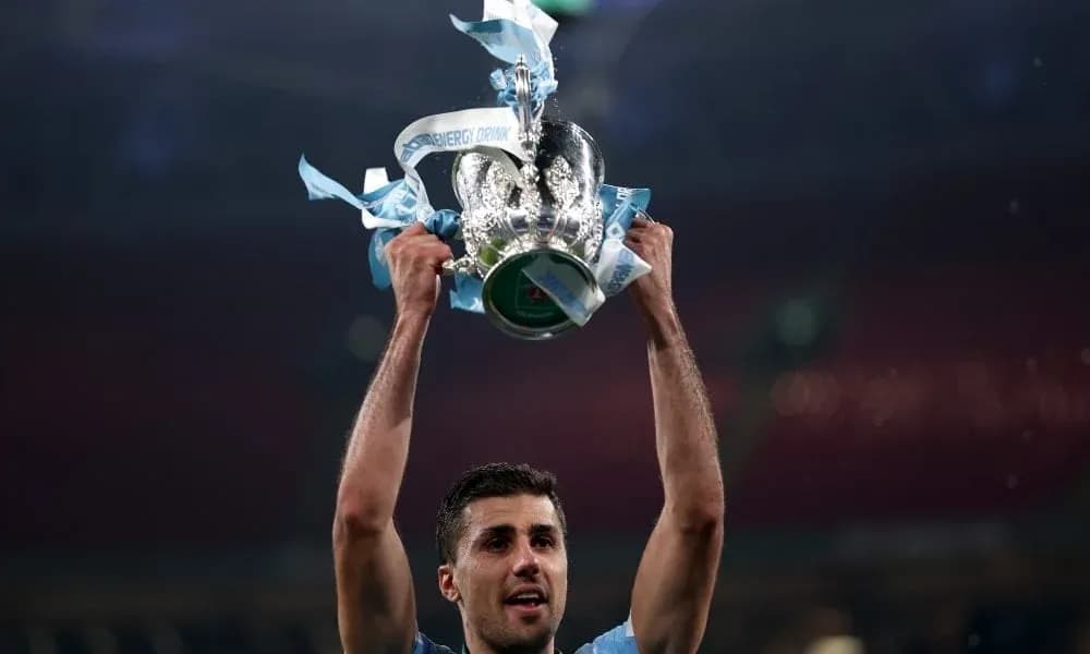Player celebrating with trophy after winning match Player celebrating with trophy after winning match