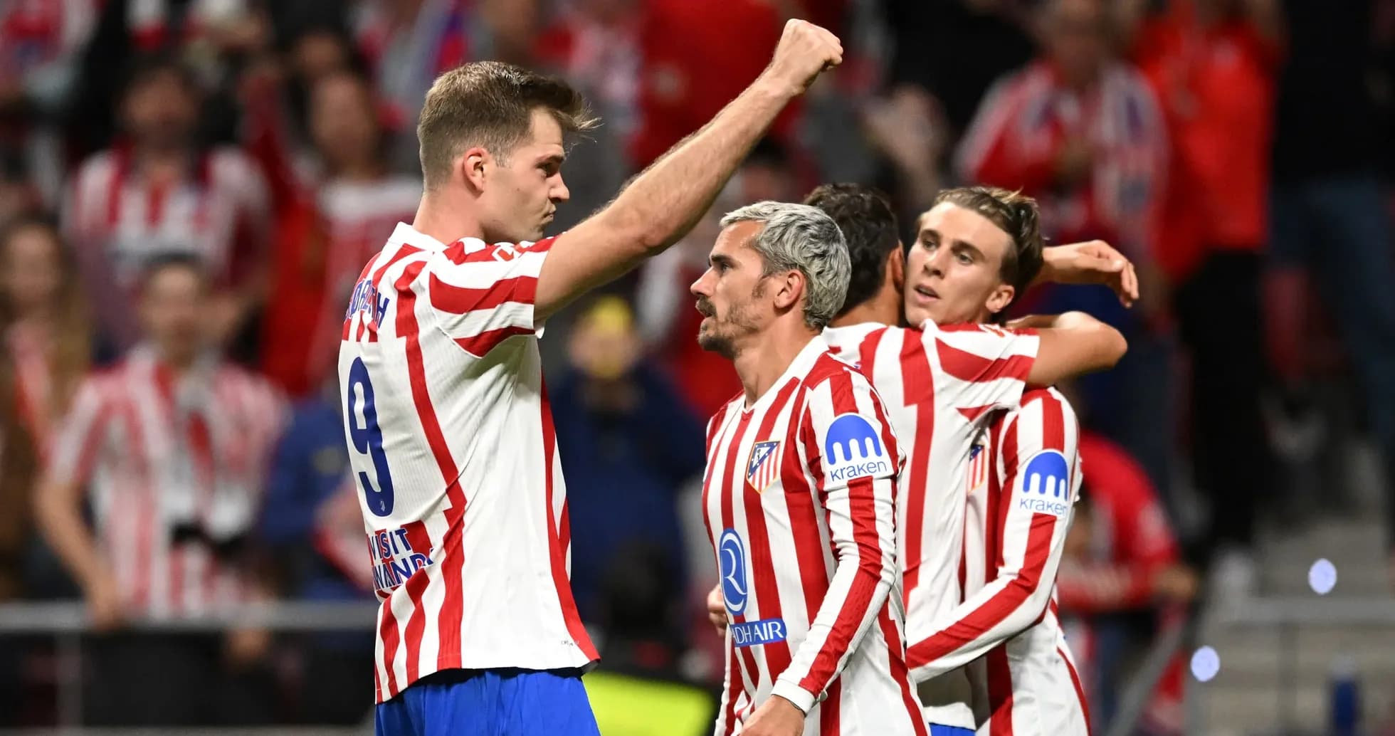 Atletico Madrid players celebrating a goal Atletico Madrid players celebrating a goal