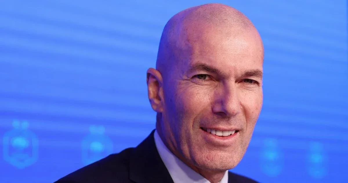 Man smiling during a press conference Man smiling during a press conference