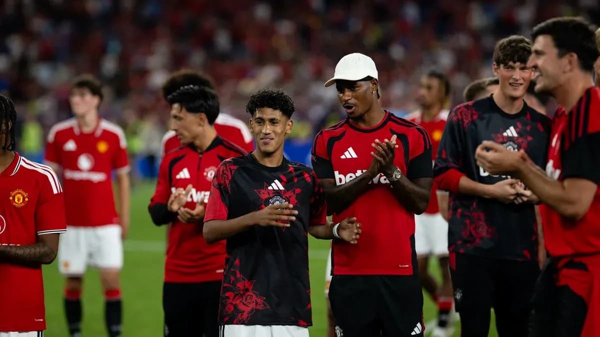 Manchester United players celebrating after the match Manchester United players celebrating after the match