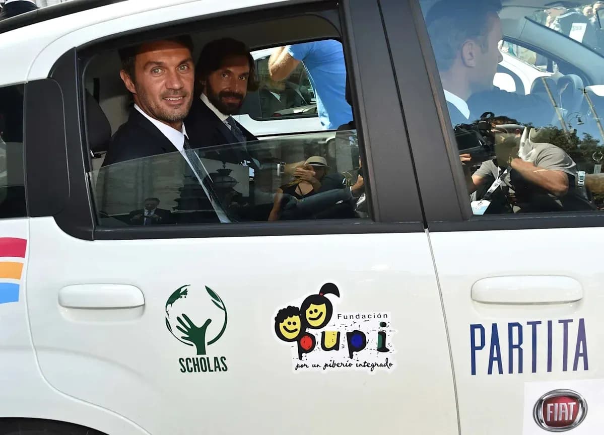Two men seated in a car during event Two men seated in a car during event