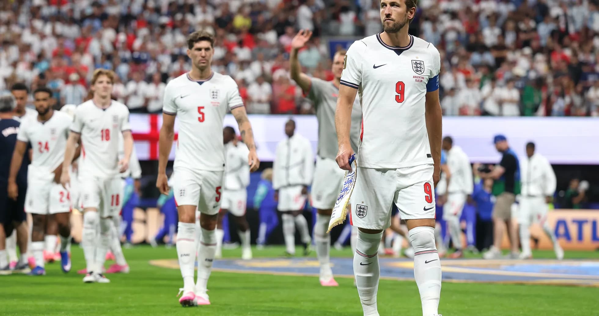 England players walking off the pitch after match England players walking off the pitch after match
