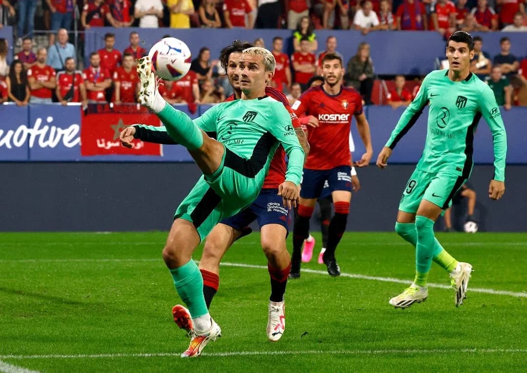 Atletico Madrid player executing a kick during match Atletico Madrid player executing a kick during match