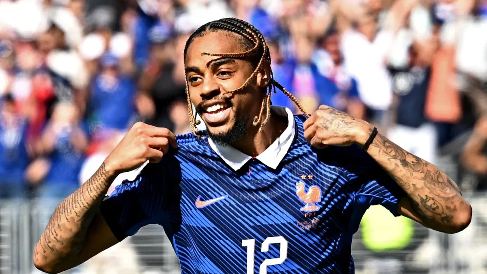 Player celebrating and showing jersey during match Player celebrating and showing jersey during match