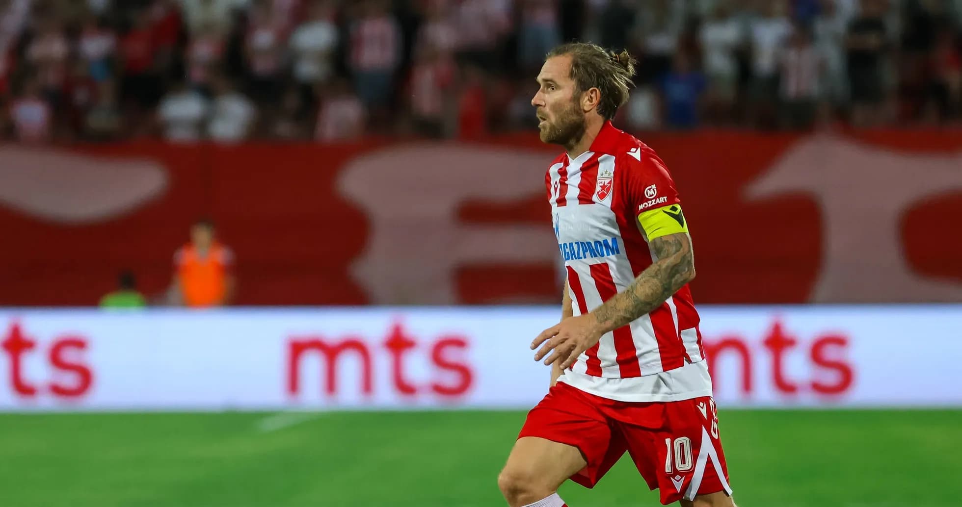 Player in action during FK Crvena Zvezda match Player in action during FK Crvena Zvezda match