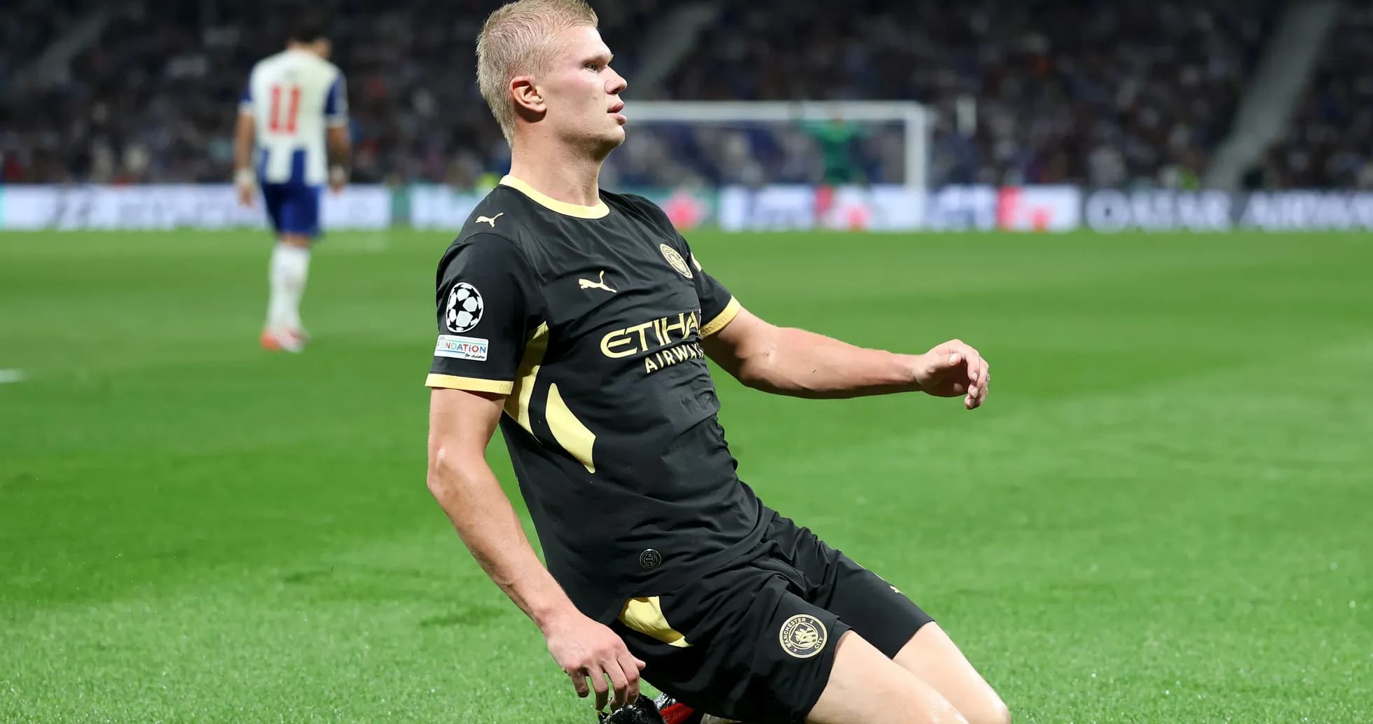 Player kneeling on field during UEFA Champions League match Player kneeling on field during UEFA Champions League match