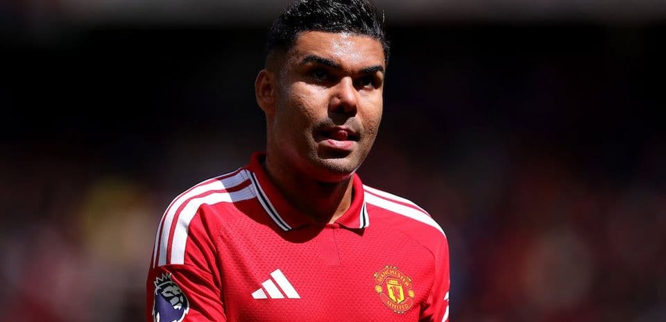 Player in Manchester United kit on the pitch Player in Manchester United kit on the pitch