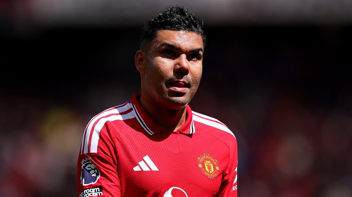Player in Manchester United kit on the pitch Player in Manchester United kit on the pitch