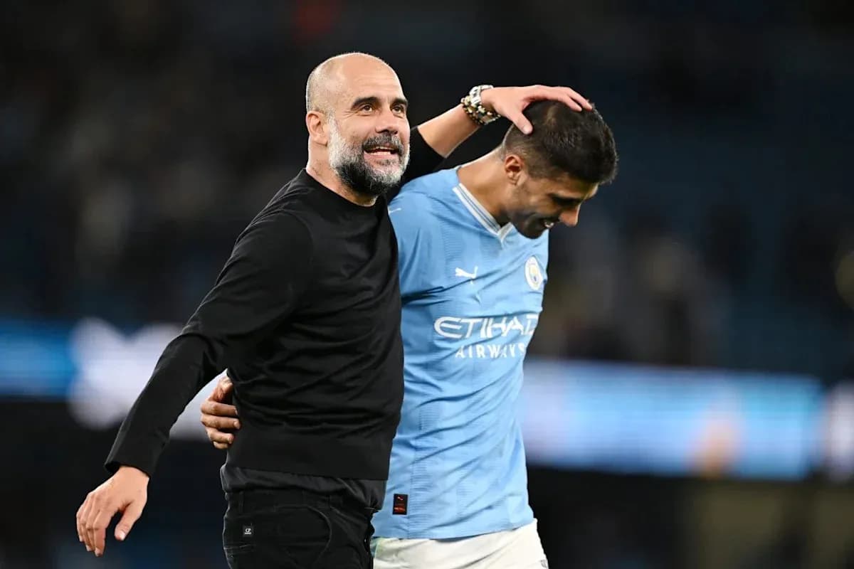 Coach and player celebrating after match at stadium Coach and player celebrating after match at stadium