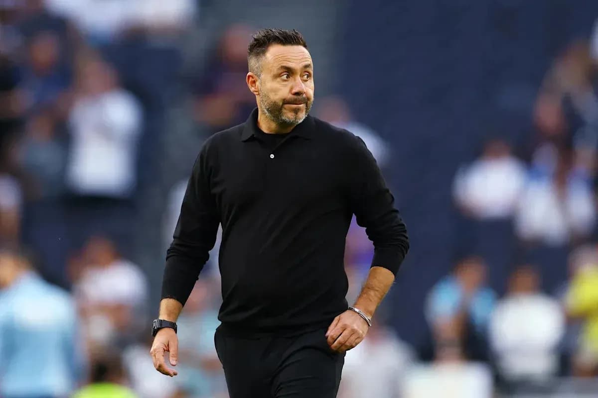 Coach walking on the sideline during match Coach walking on the sideline during match