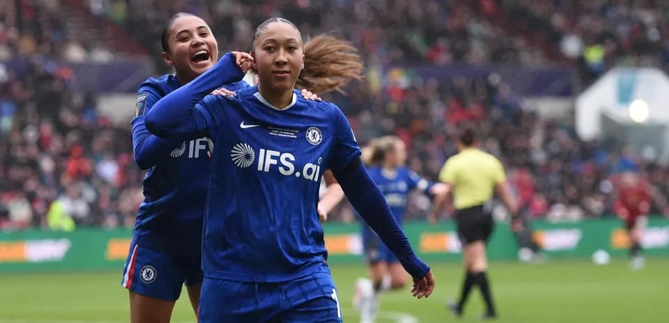 Chelsea players celebrate during a match. Chelsea players celebrate during a match.