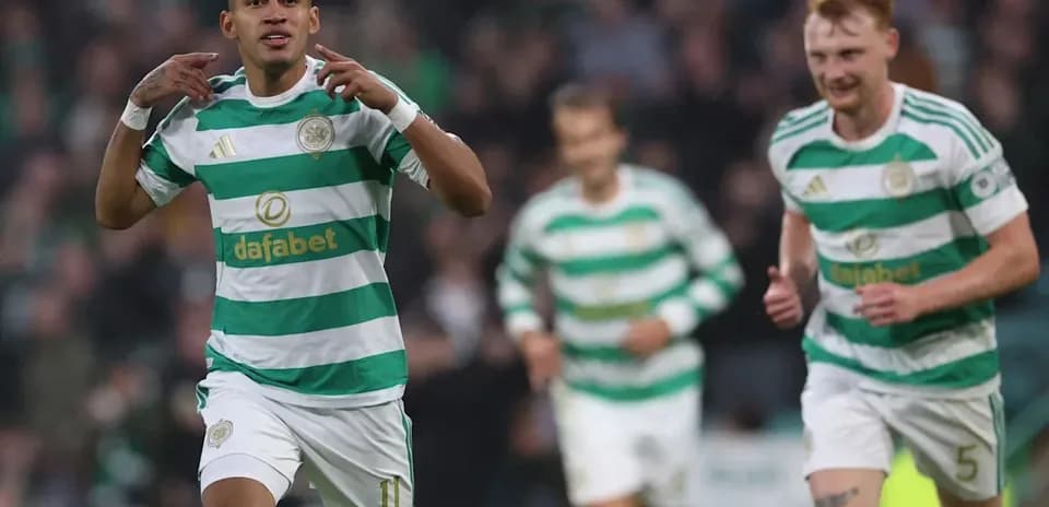 Celtic players celebrating a goal during match Celtic players celebrating a goal during match
