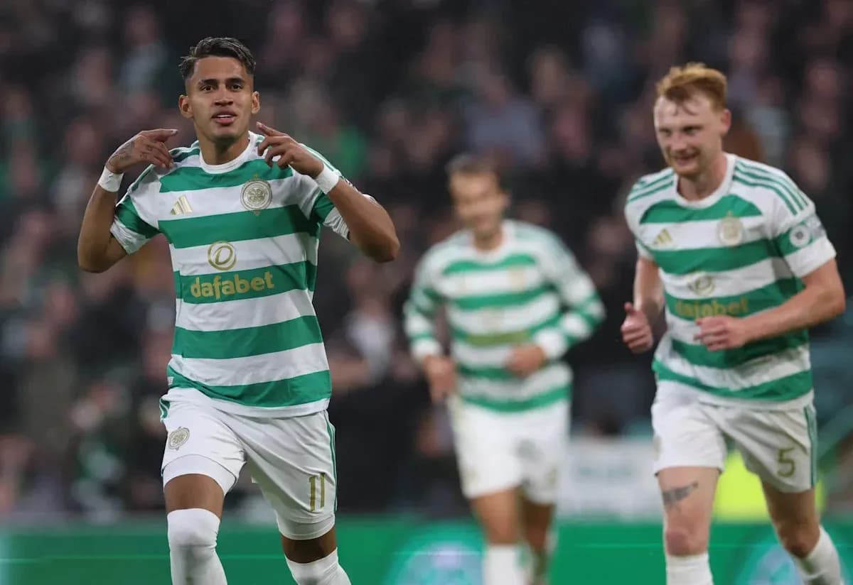 Celtic players celebrating a goal during match Celtic players celebrating a goal during match