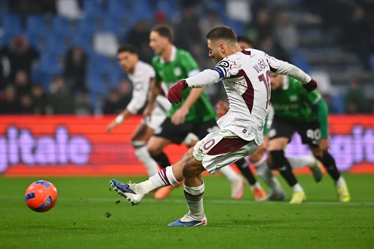 Player taking a penalty kick during match Player taking a penalty kick during match