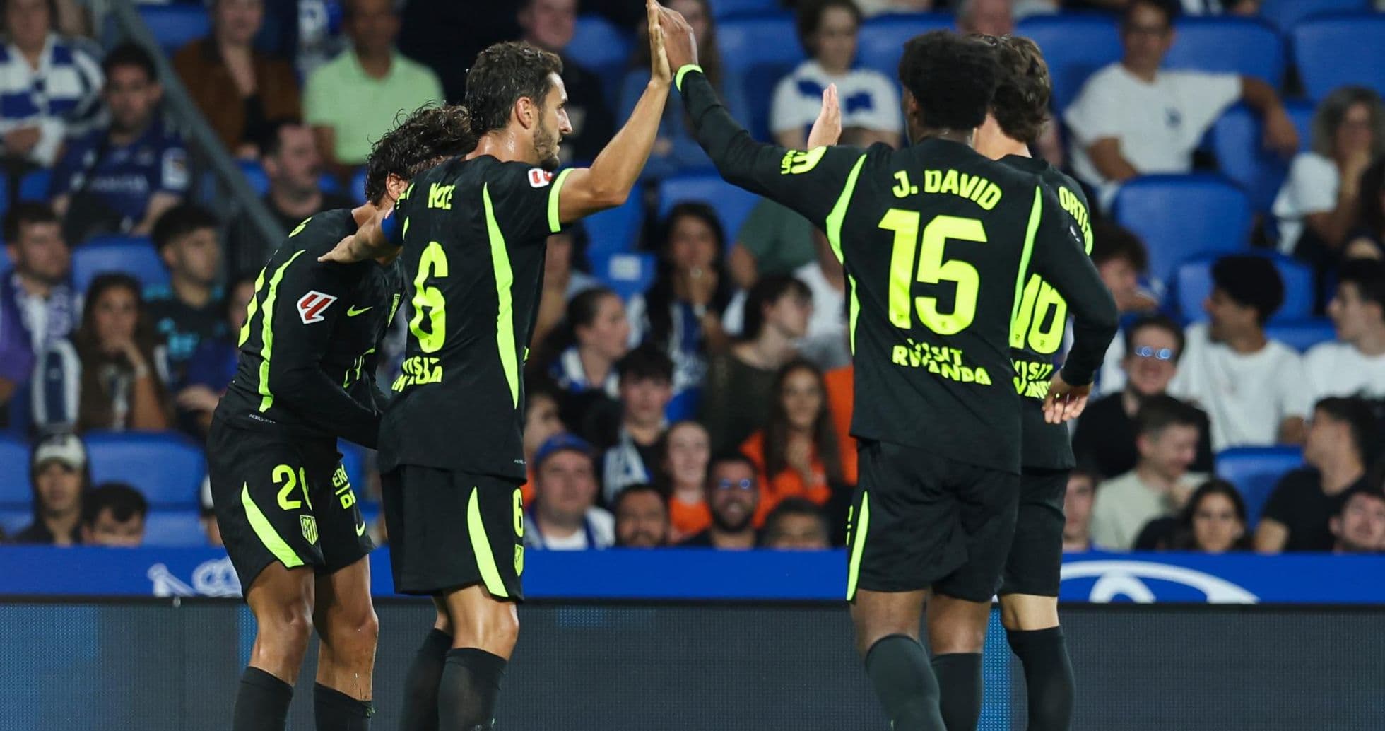Atletico Madrid players celebrating a goal Atletico Madrid players celebrating a goal
