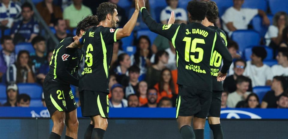 Atletico Madrid players celebrating a goal Atletico Madrid players celebrating a goal