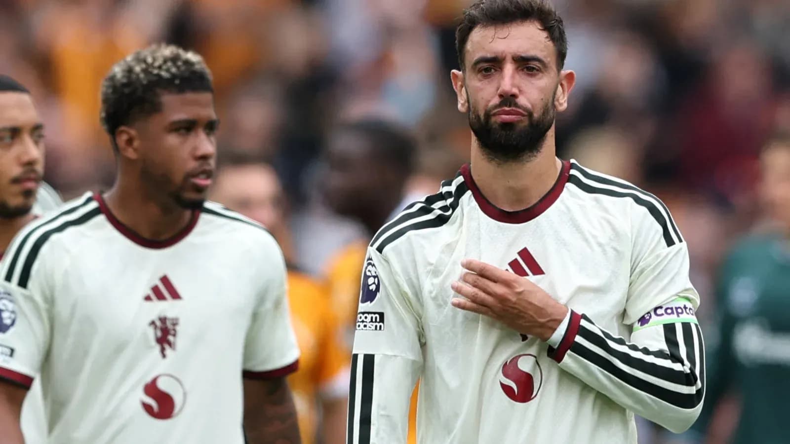 Bruno Fernandes and teammate walking off the pitch Bruno Fernandes and teammate walking off the pitch