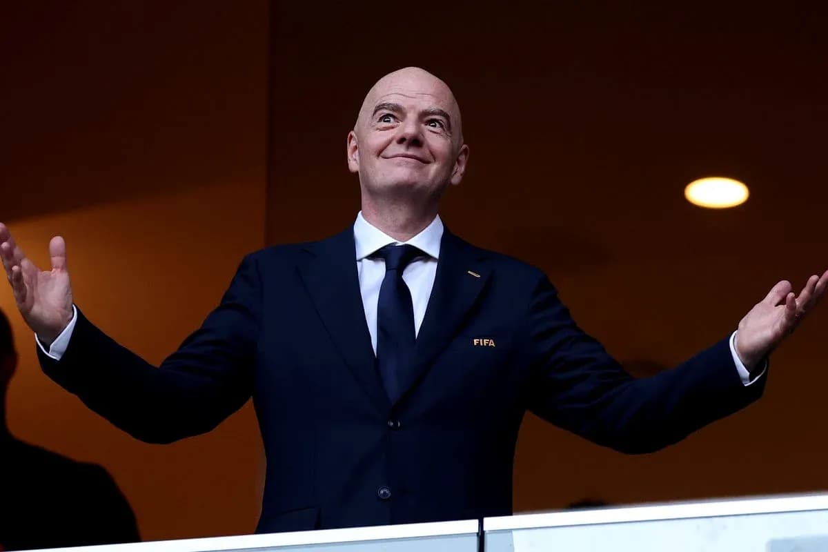 FIFA president gesturing from VIP box during event FIFA president gesturing from VIP box during event