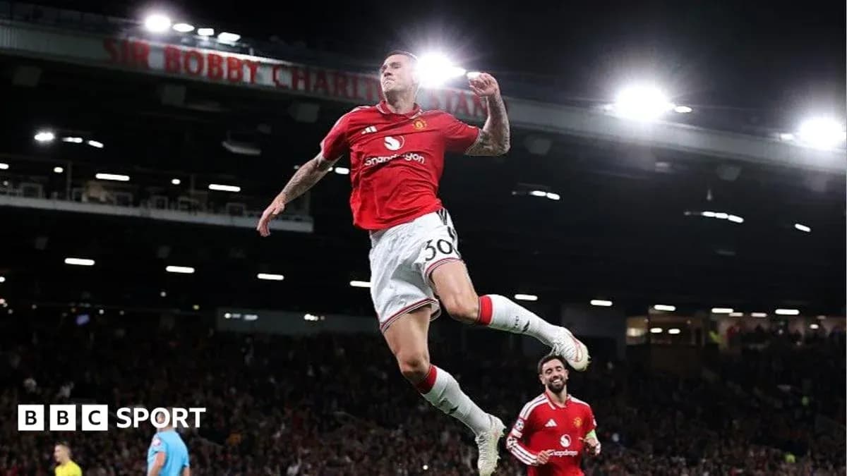 Player celebrating a goal during a match Player celebrating a goal during a match