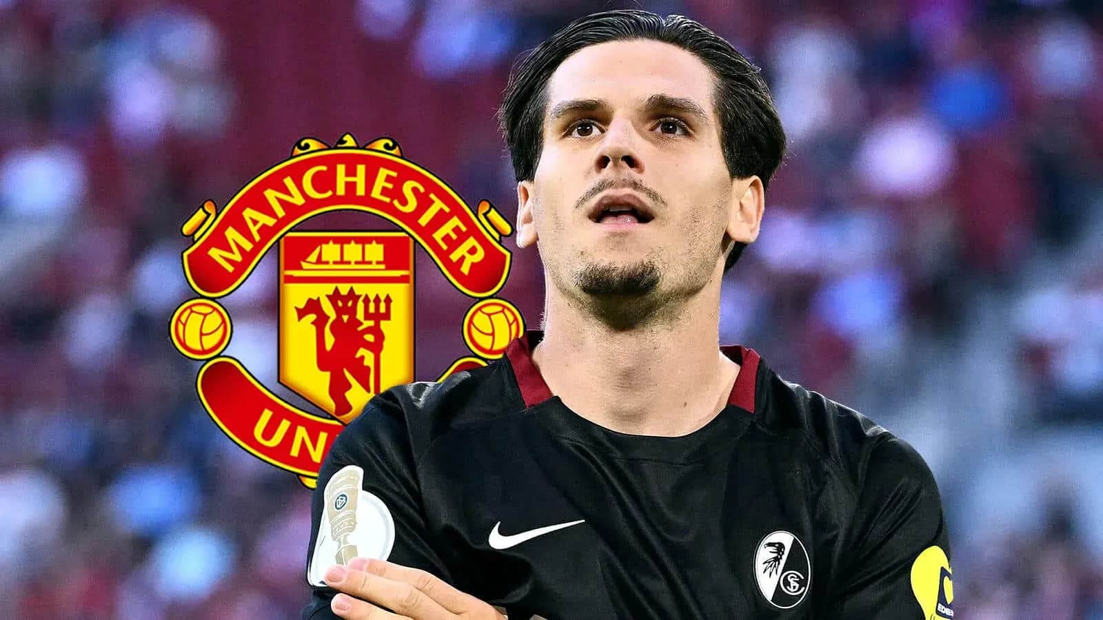 Player in black jersey with Manchester United logo background Player in black jersey with Manchester United logo background