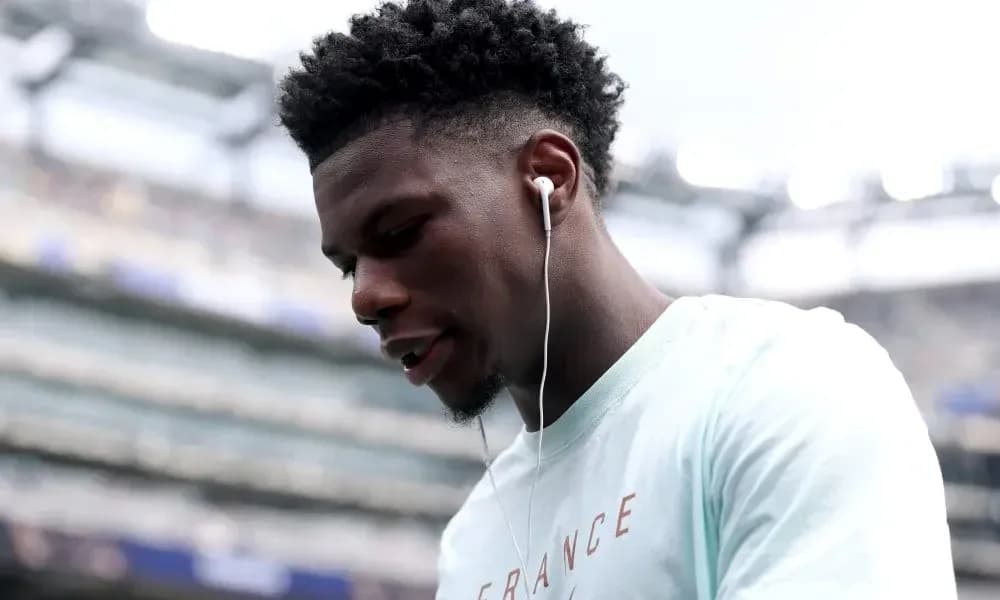 Player wearing headphones before the match Player wearing headphones before the match