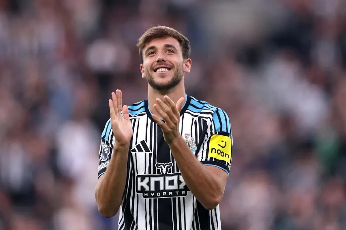 Player applauding fans during a match celebration Player applauding fans during a match celebration