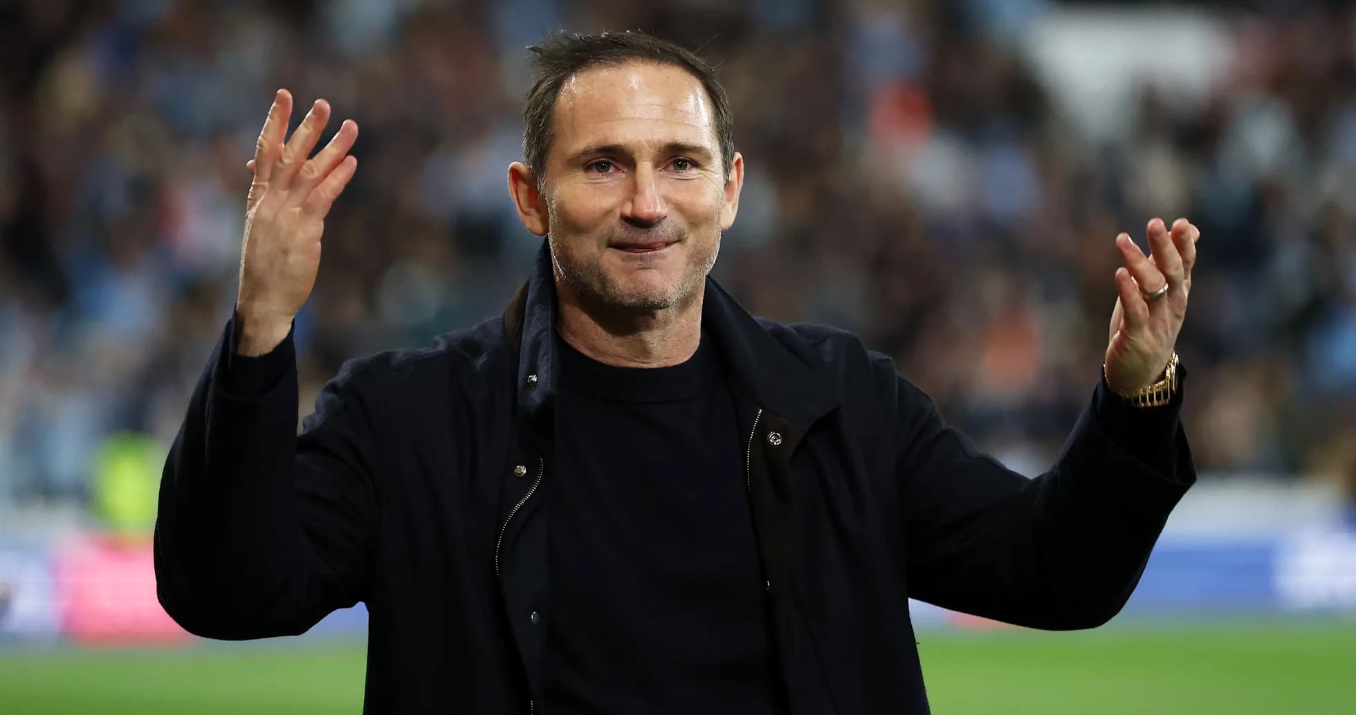 Coach gesturing during a match celebration Coach gesturing during a match celebration